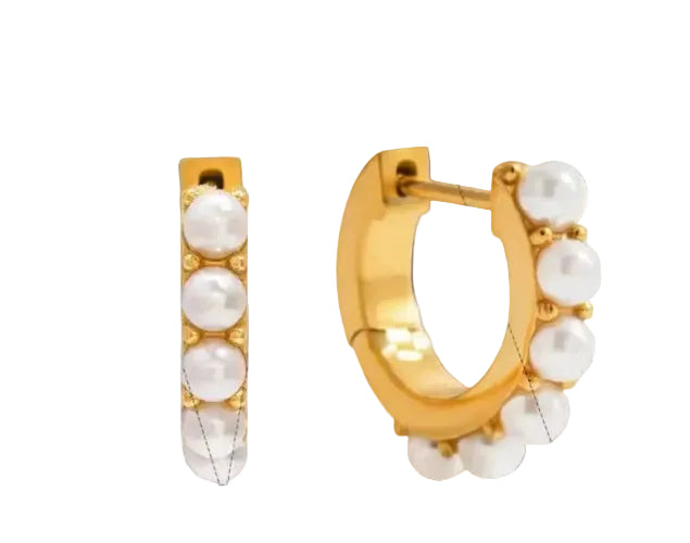 Gold hoop earrings with pearls on a white background