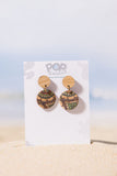 Wooden earrings on a 'POP Dangle' branded card with a beach background