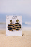 Black and gold striped earrings on a 'Pop Dangle' branded card with a beach background.