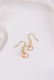 Pair of pink pearl gold earrings