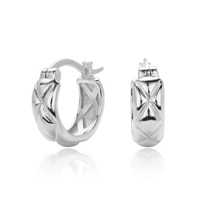 Silver hoop earrings on a white background