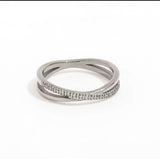 Silver ring with small diamonds on a white background
