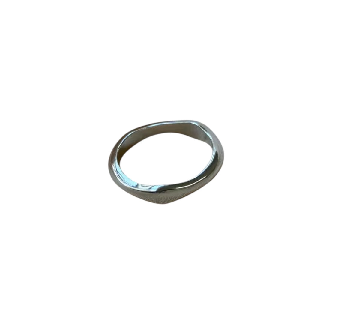 Silver ring on a white background