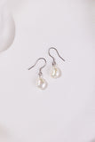 Pair of white pearl earrings on asilver hooks