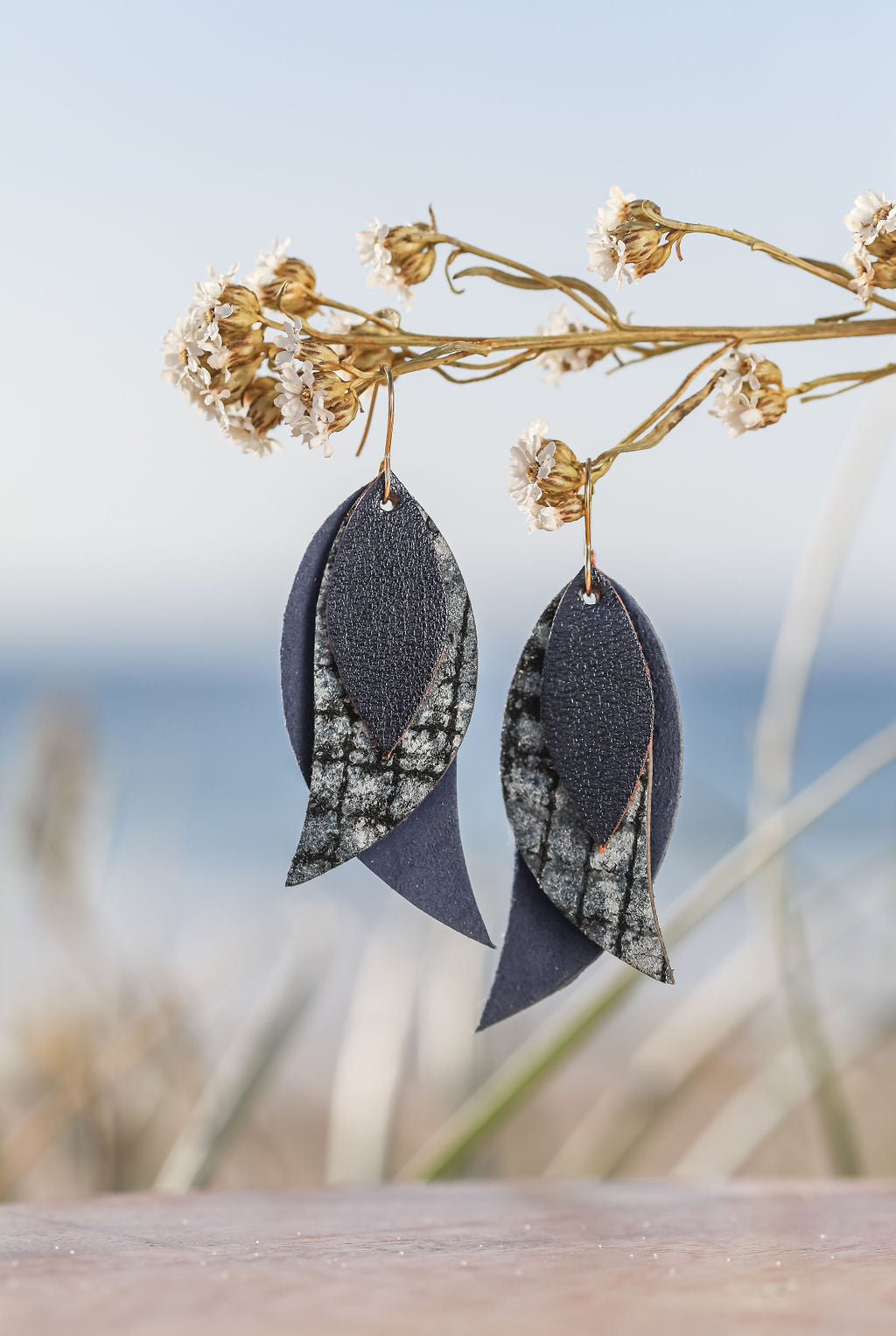 navy triple leaf drop earrings
