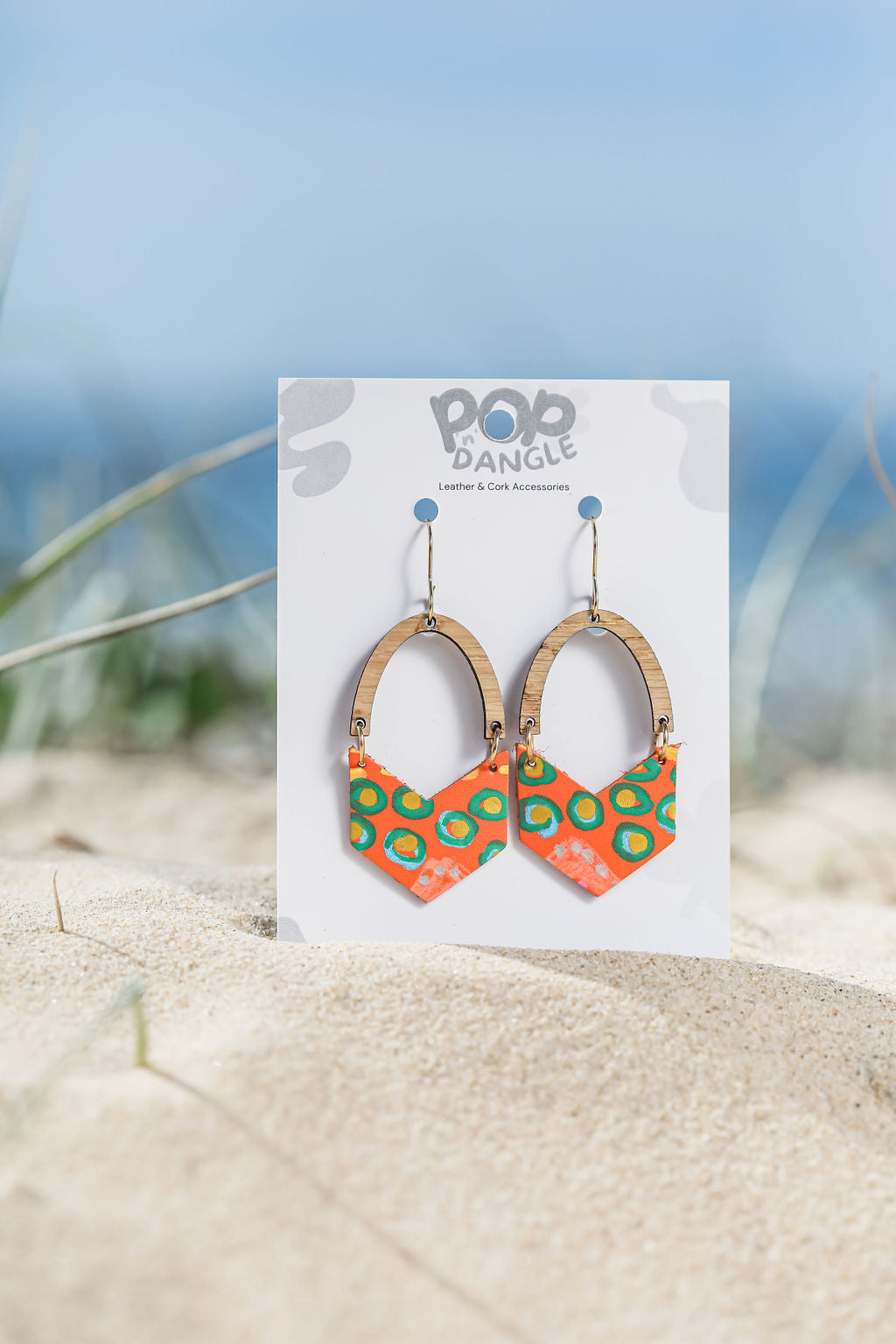 timber Arch.V-shaped handpainted leather earrings