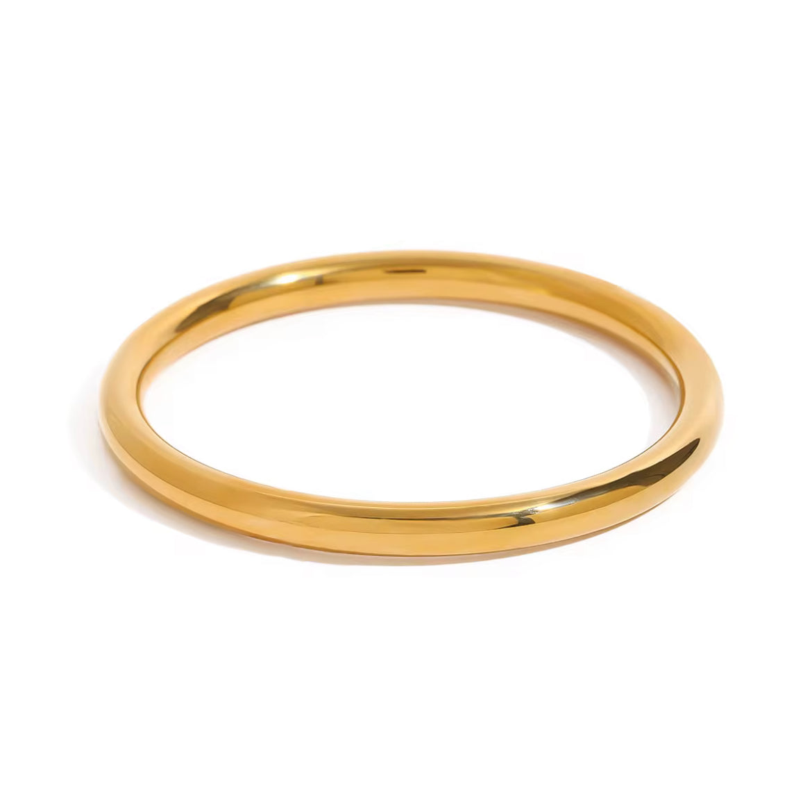 Gold ring on a white background