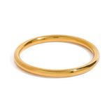Gold ring on a white background