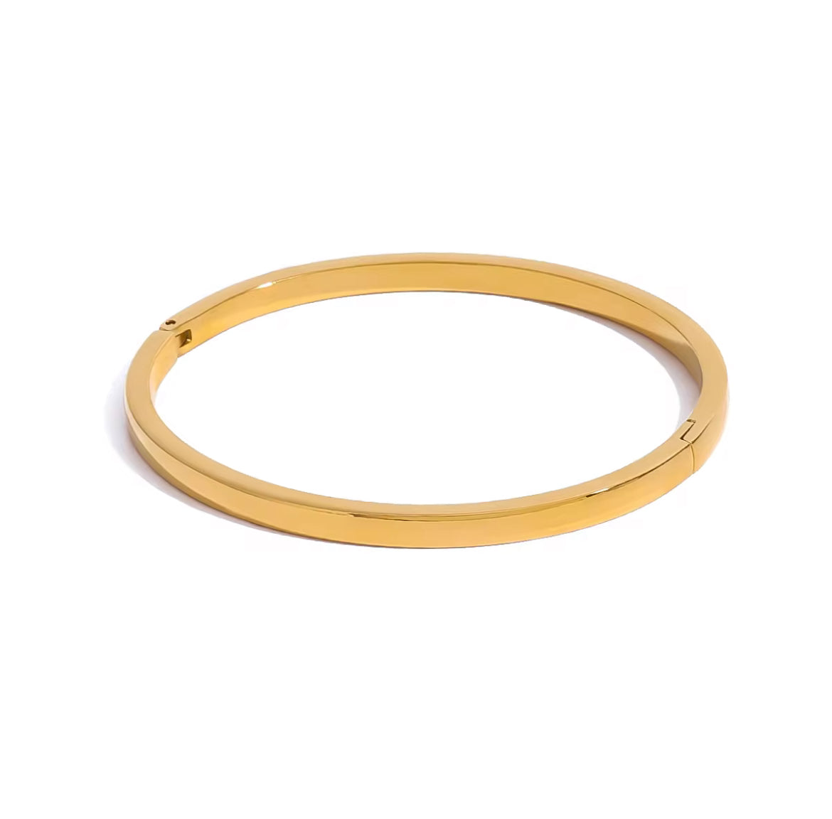 Gold bangle on a white background