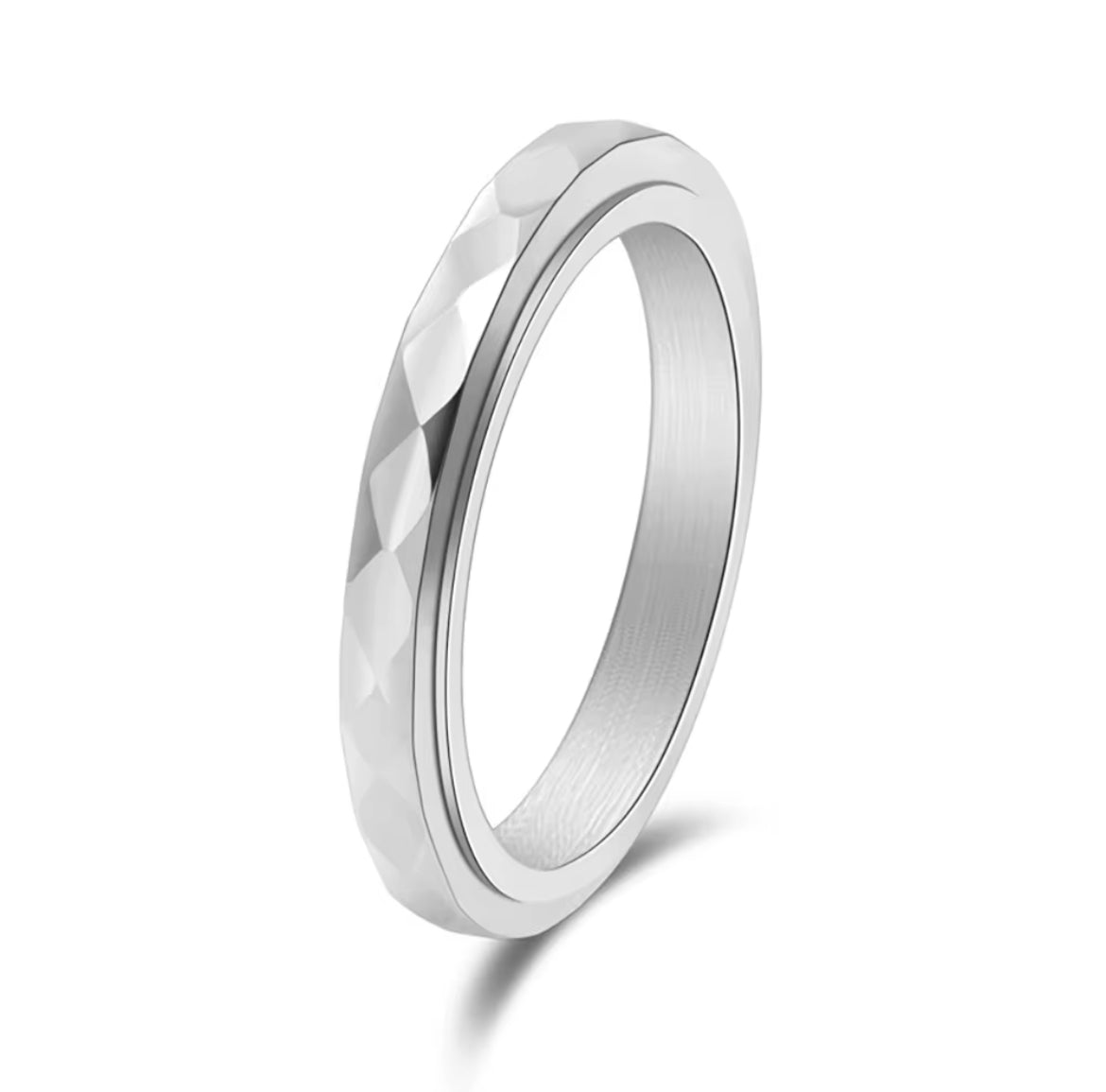 Silver ring with a textured design on a white background