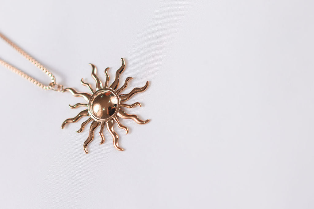 Gold sun-shaped pendant on a chain Sun Pendant Necklace – Waterproof, tarnish-resistant
