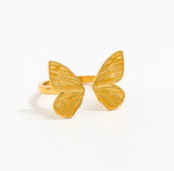 PVD Gold butterfly ring on white background 