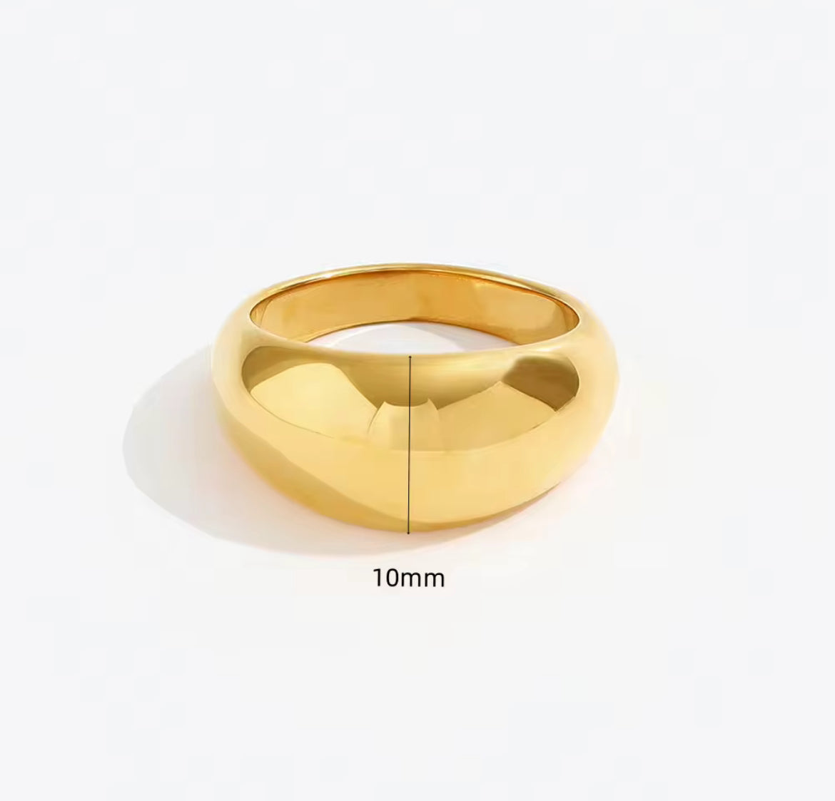 Waterproof dome Gold Ring on white back ground 
