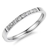 Silver ring with small diamonds on a white background