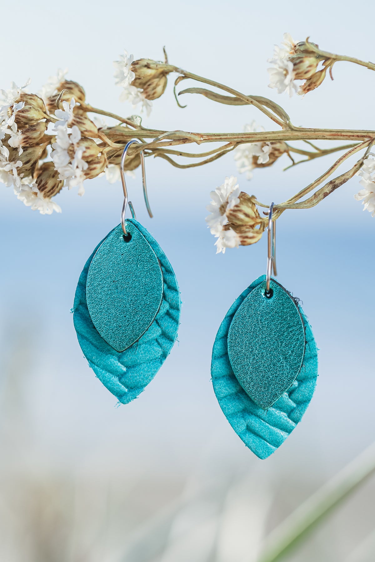 turquoise emboissed  drop  earrings 