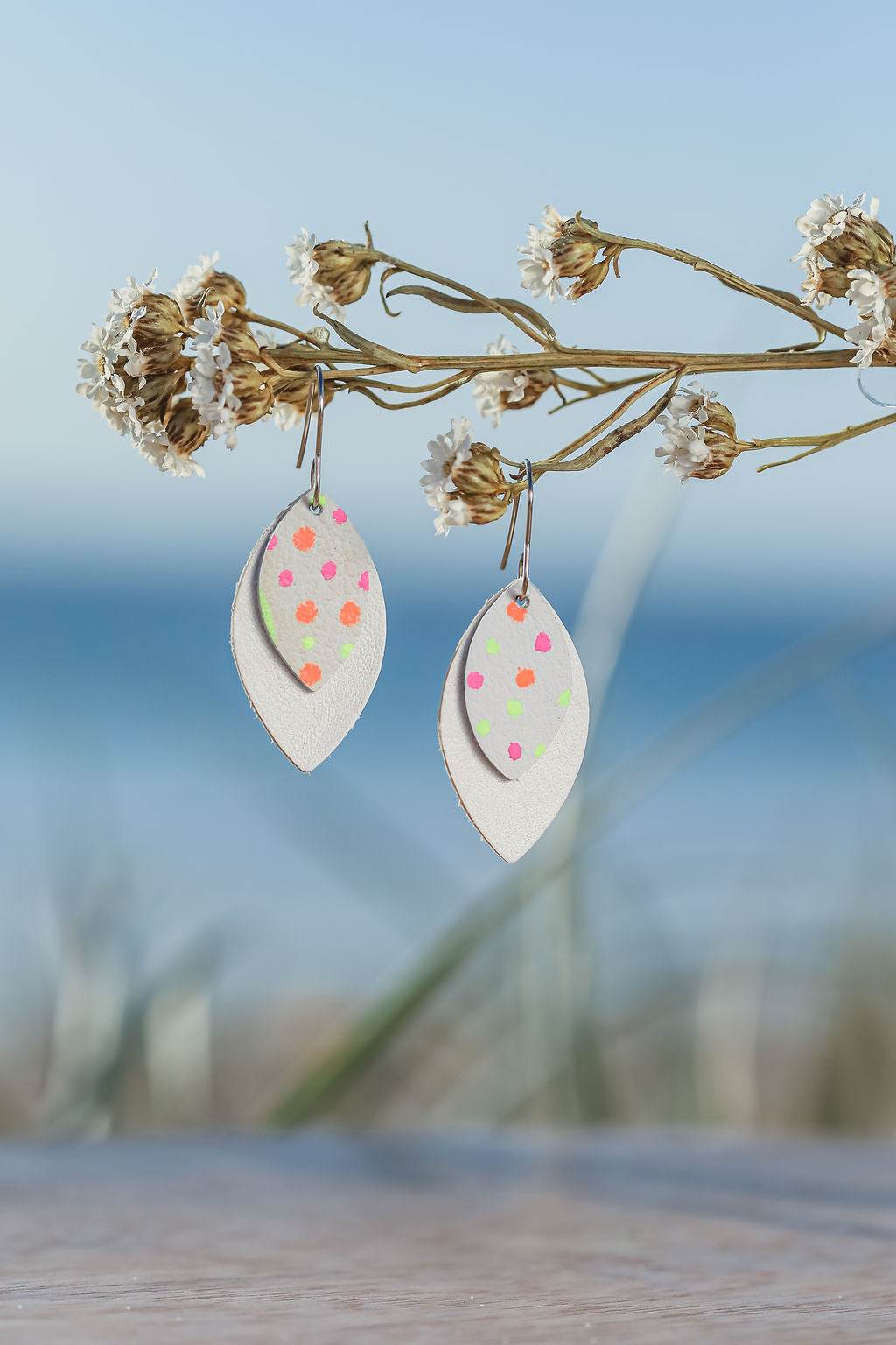 white handpainted dots on Kangaroo leather earrings 